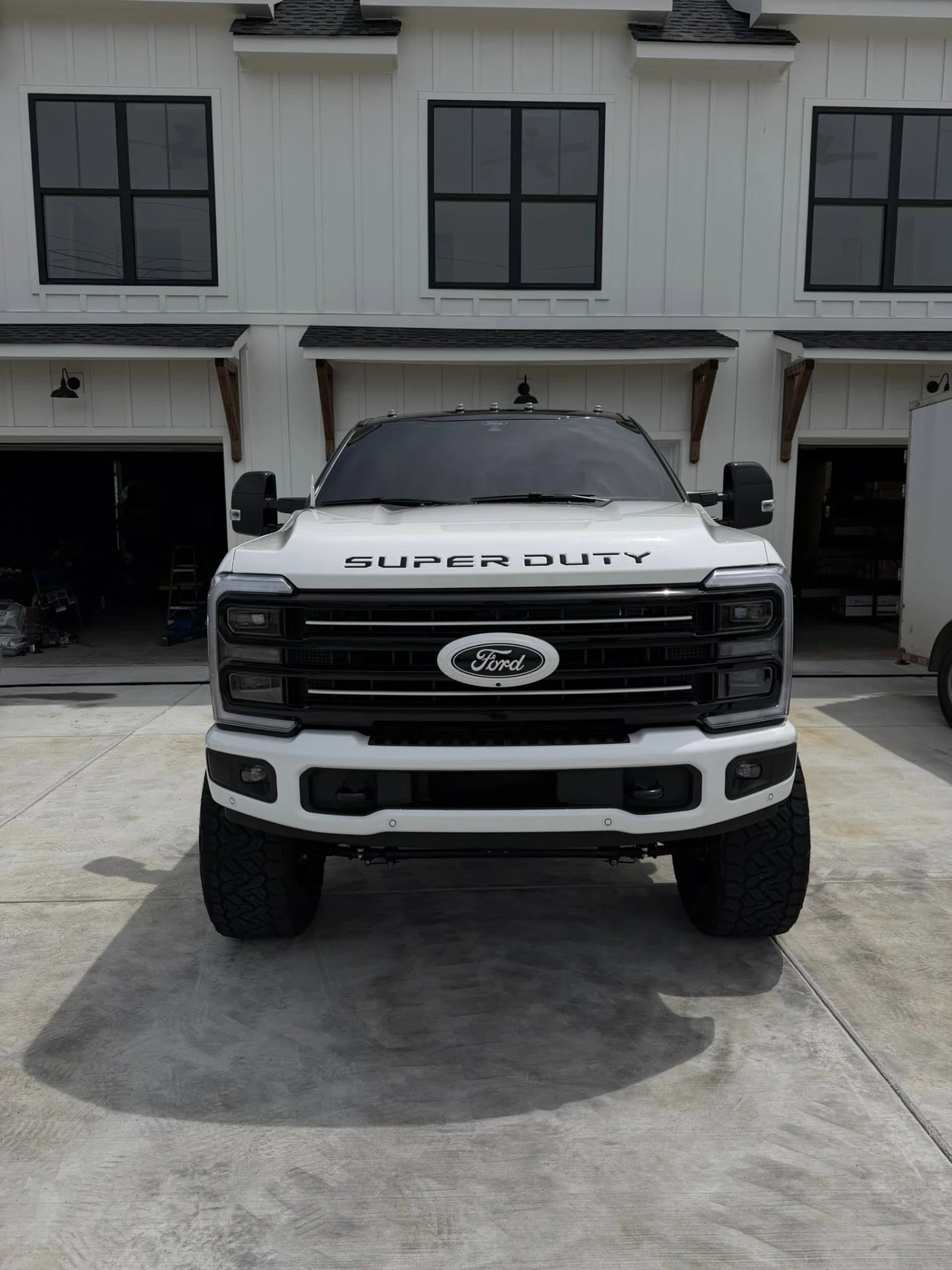 White Ford F-250 Super Duty front grille after wash