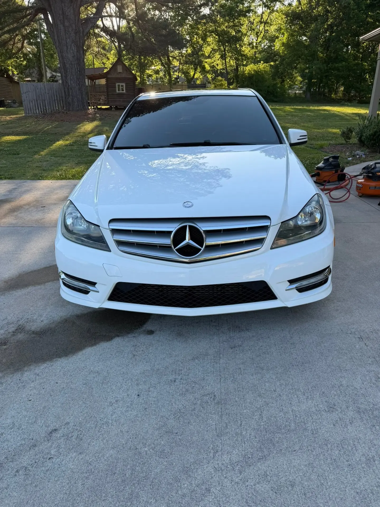 White Mercedes-Benz C-Class front after full detail