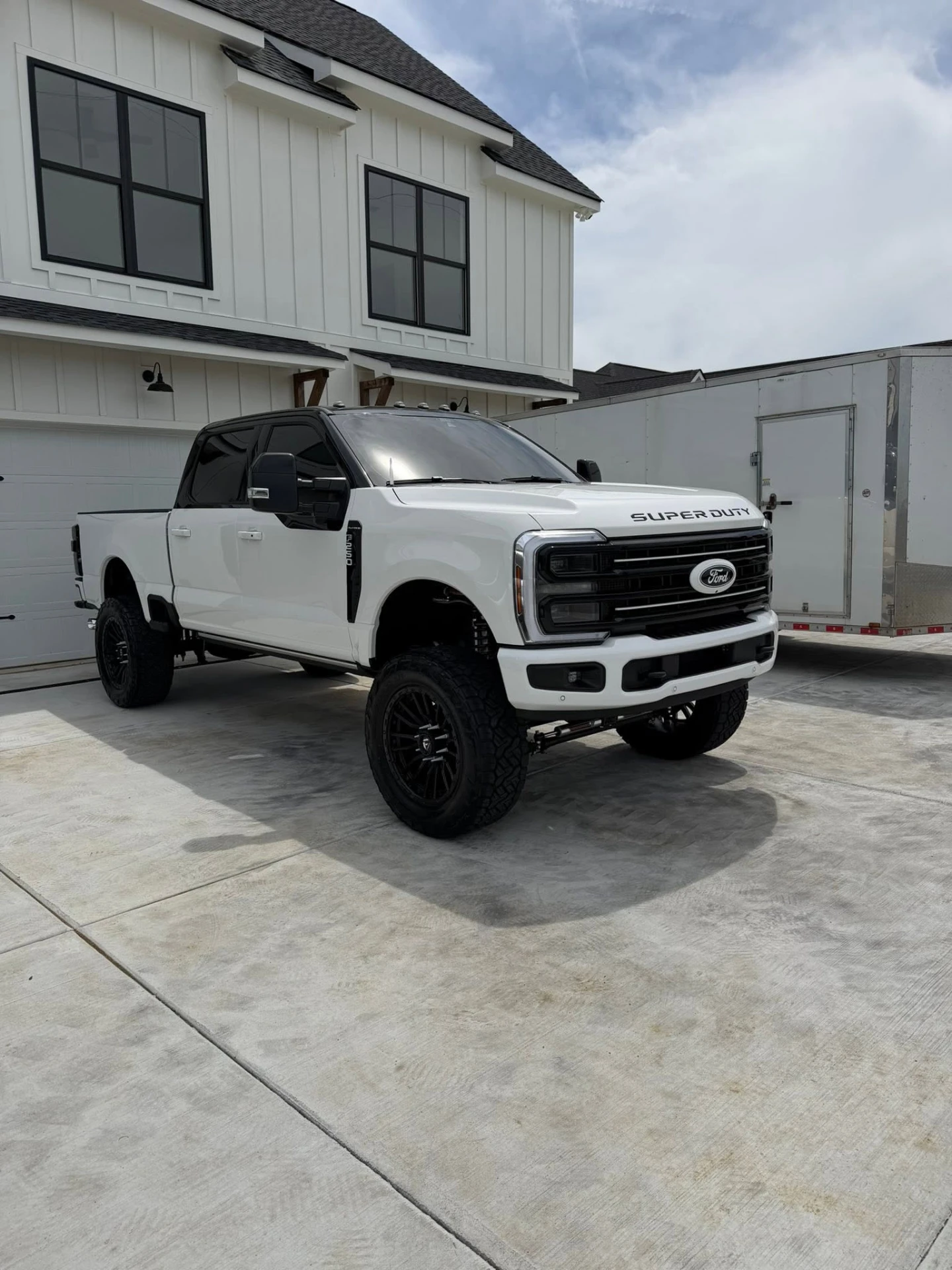 White Ford F-250 Super Duty front quarter after detail