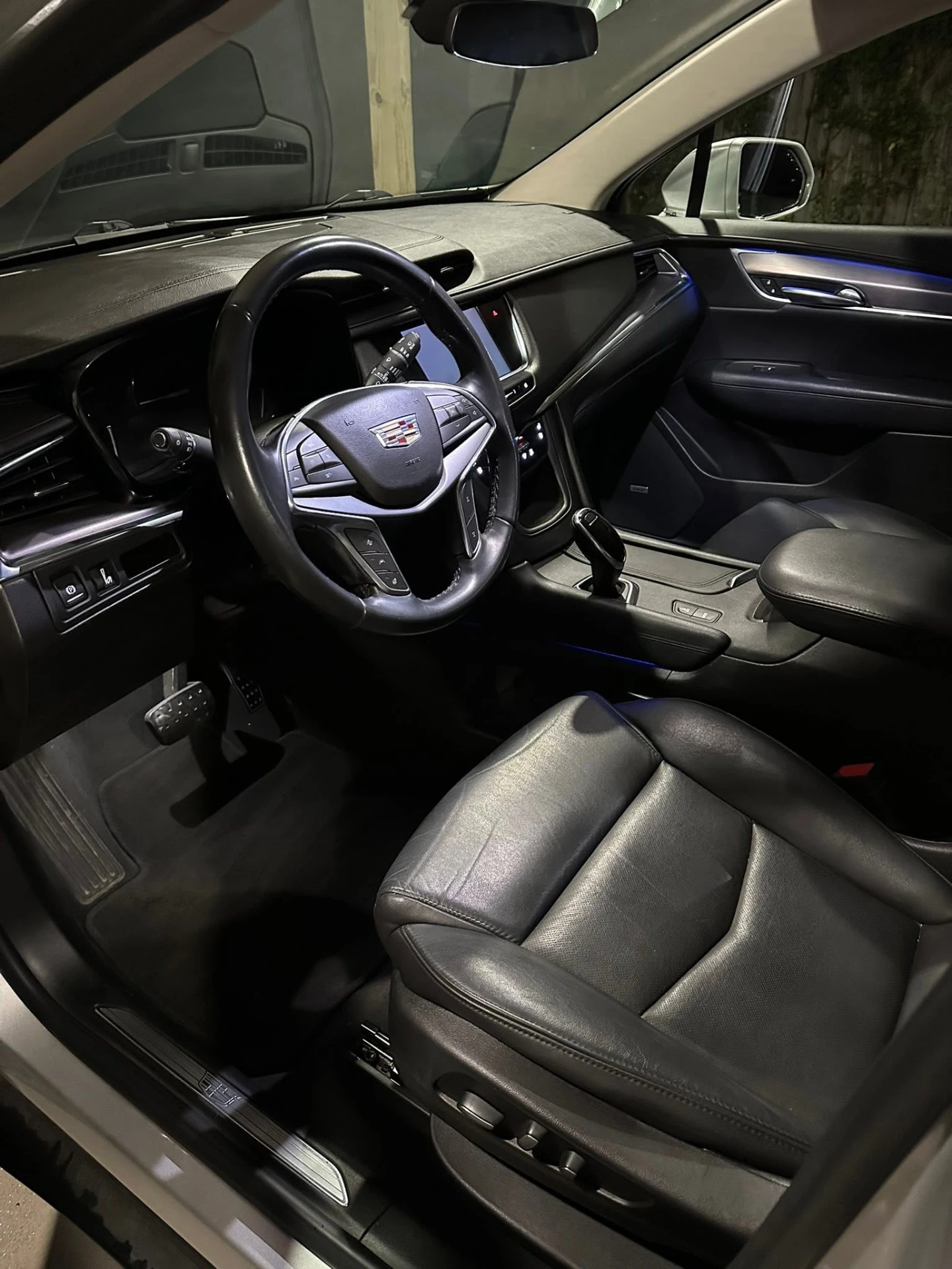 Cadillac XT5 interior driver side with ambient lighting after detail